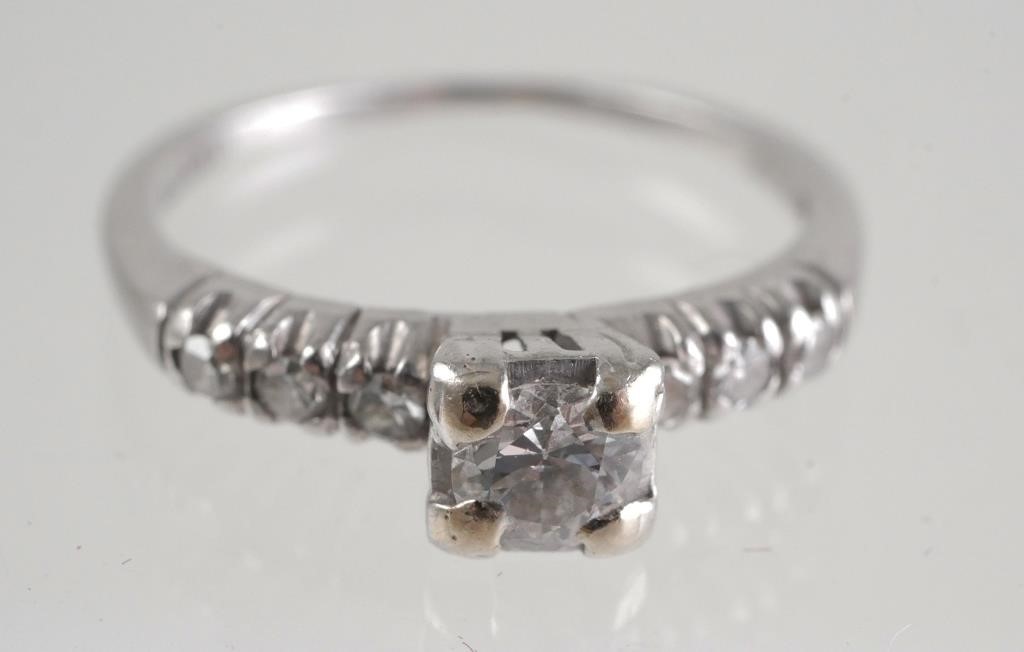 Appraisal: Marked palladium ring with diamonds including -point center stone Weighs