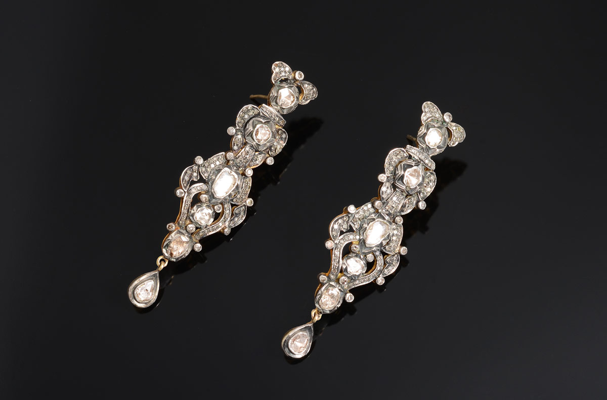 Appraisal: DIAMOND DROP EARRINGS K yellow gold and sterling silver earrings