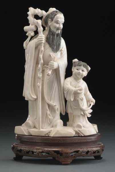 Appraisal: Chinese carved ivory figure group International buyers should note that