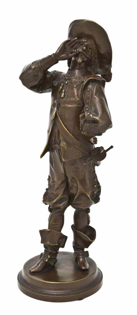 Appraisal: A French Bronze Figure depicting a cavalier standing atop a