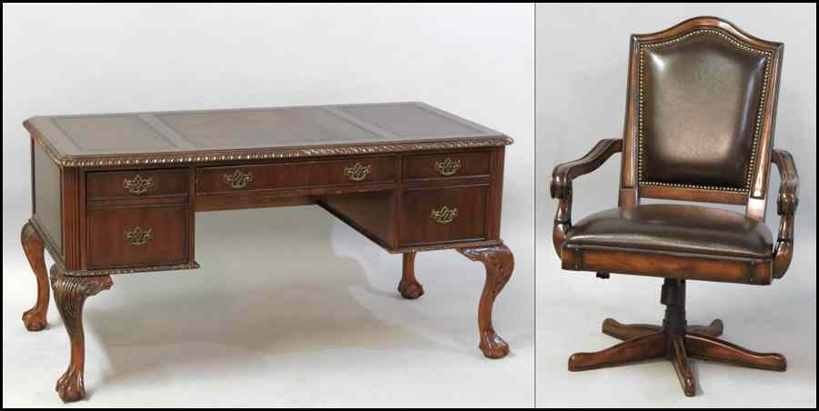 Appraisal: MAHOGANY LIBRARY DESK Together with an open swivel armchair Desk