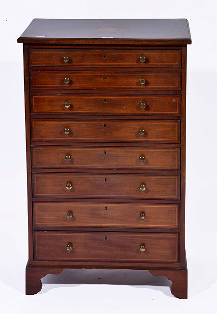 Appraisal: A MAHOGANY AND SATINWOOD INLAID TALL CHEST of eight long