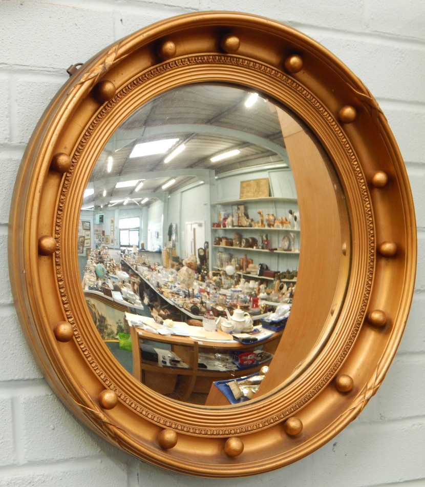 Appraisal: A modern gilt convex wall mirror cm diameter