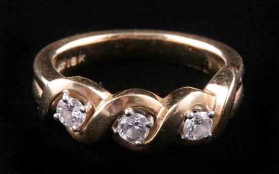 Appraisal: K YELLOW GOLD PLATINUM AND DIAMOND RING Three round full