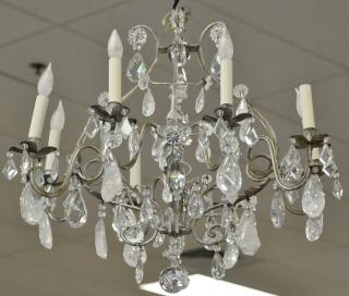 Appraisal: Eight light chandelier having rock crystal and crystal prisms ht