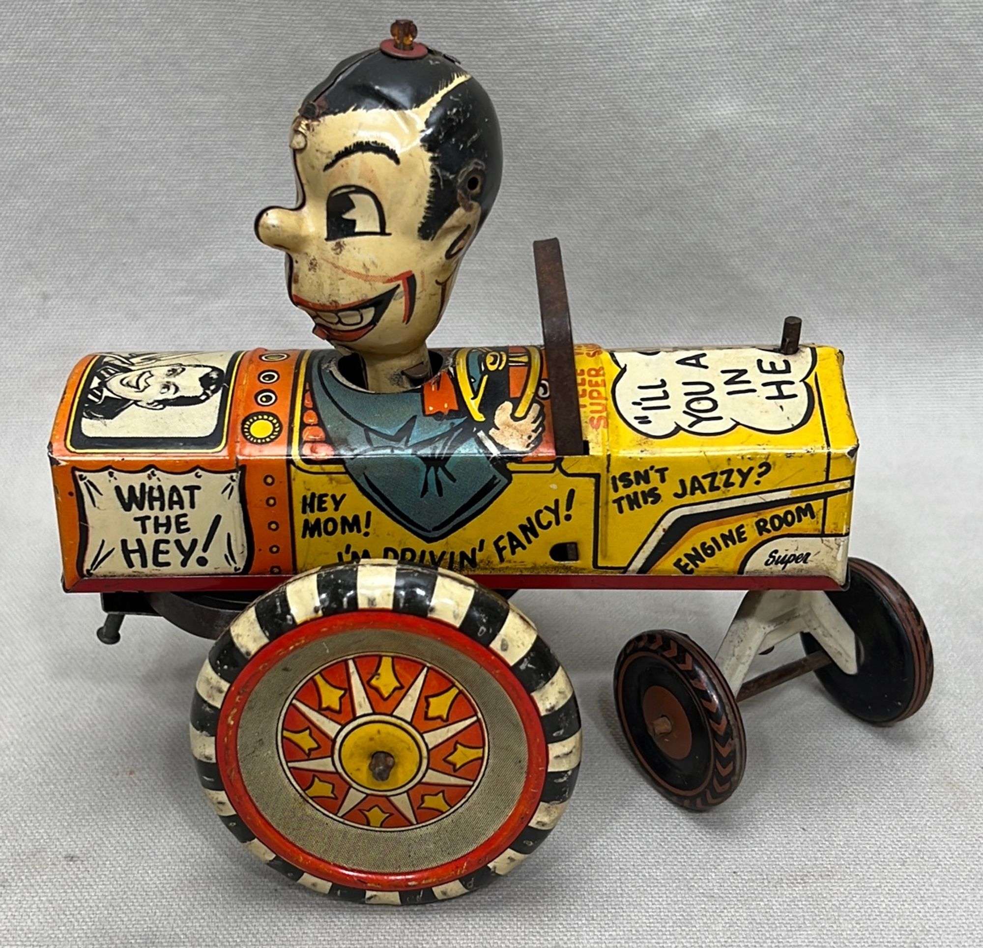 Appraisal: Louis Marx Milton Berle tin wind-up car toymid th century