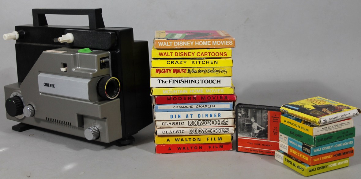 Appraisal: An movie projector and a quantity of various films to