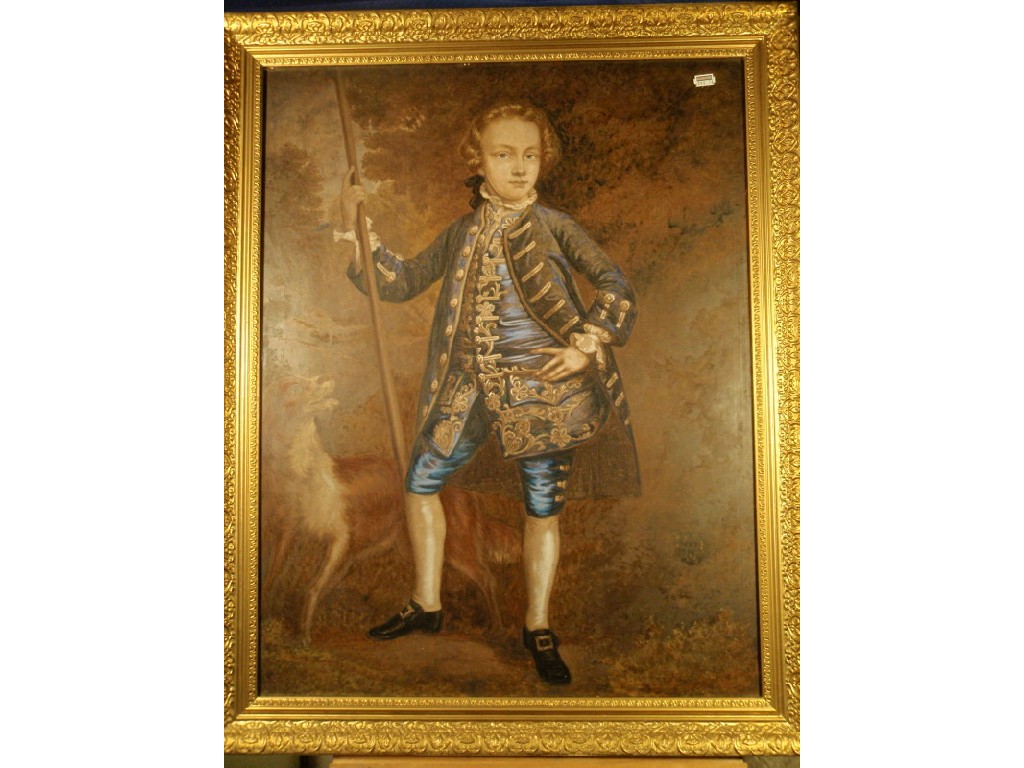 Appraisal: A boy dressed in blue braided jacket waistcoat and breeches