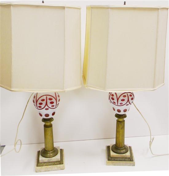 Appraisal: Pair fluid lamps electrified cased white to cranberry glass fonts