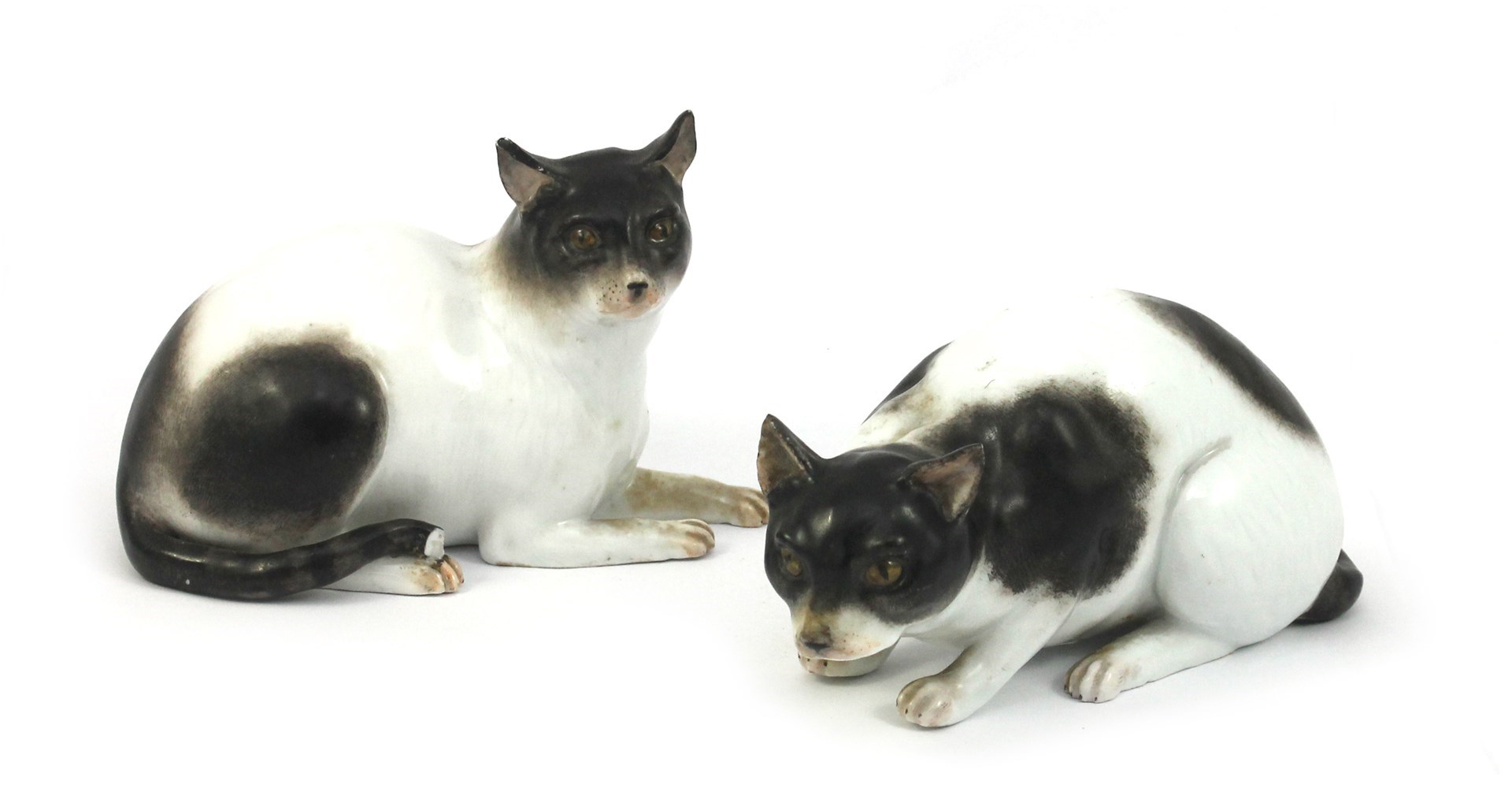 Appraisal: A pair of Meissen figures of cats th century modelled