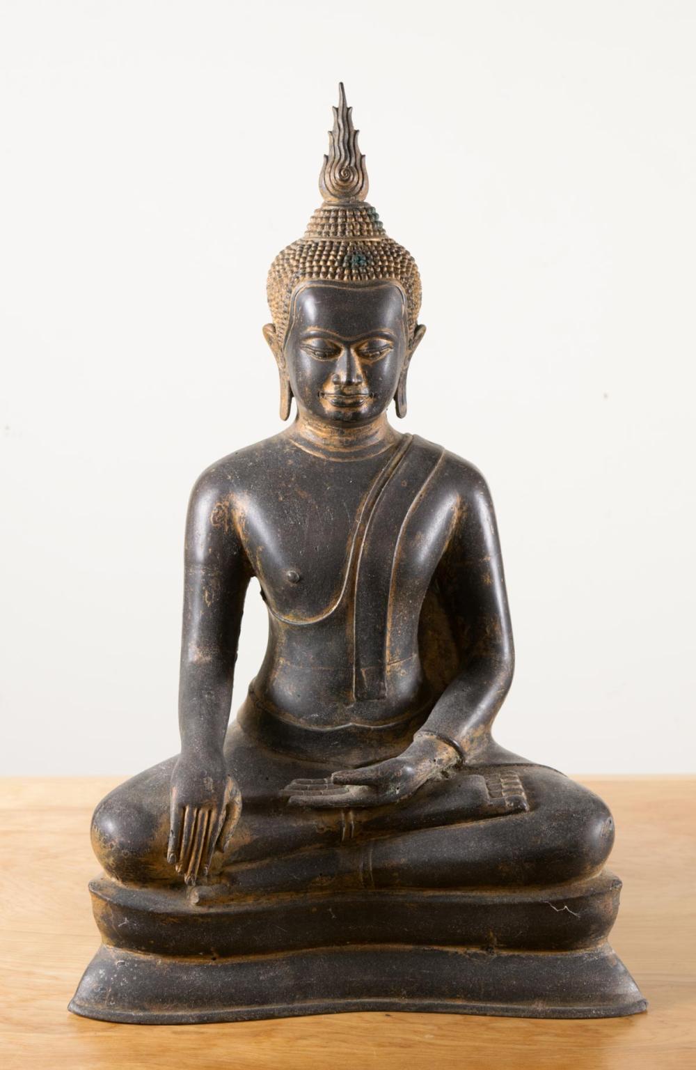 Appraisal: THAI PARCEL GILT METAL FIGURE OF BUDDHA seated in bhumisparsa