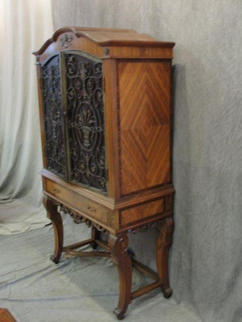 Appraisal: Satinwood and Carved China Cabinet With arts crafts glass and