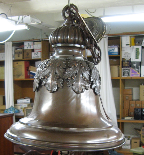 Appraisal: A PAIR OF HANGING LIGHT FIXTURES both of bronzed metal