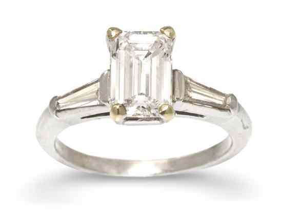 Appraisal: A Platinum and Diamond Ring containing one octagonal step cut