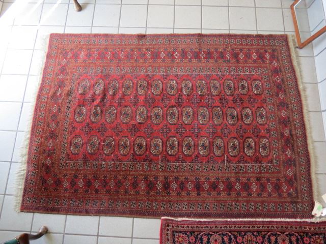 Appraisal: Belouchi Afganistan Handmade Rug interesting geometrics on deep burgundy field