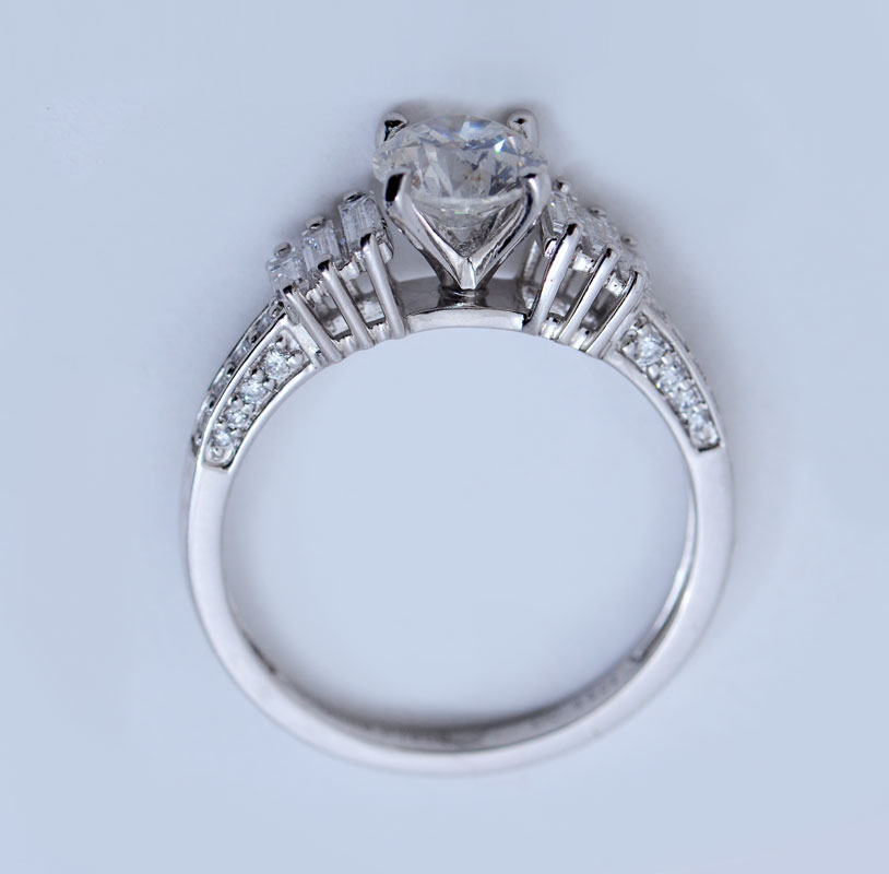 Appraisal: PLATINUM AND CTW DIAMOND RING CT round brilliant cut diamond