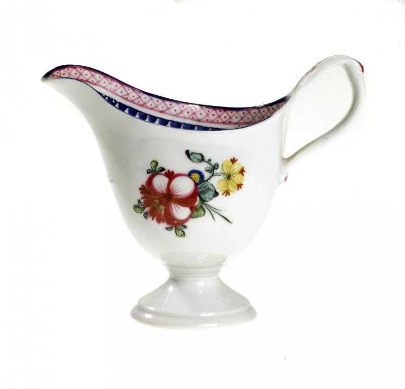 Appraisal: A NEW HALL CREAM JUG pattern of helmet shape painted