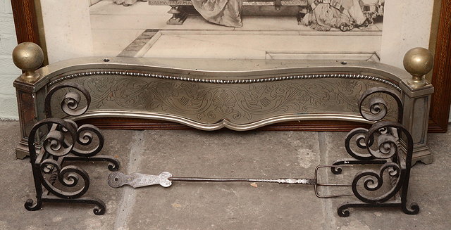 Appraisal: A STEEL SERPENTINE FENDER with engraved acanthus leaf decoration and