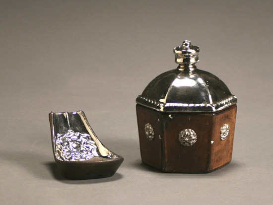 Appraisal: English Silver Lustre and Leather Tobacco Jar and Pipe Rest