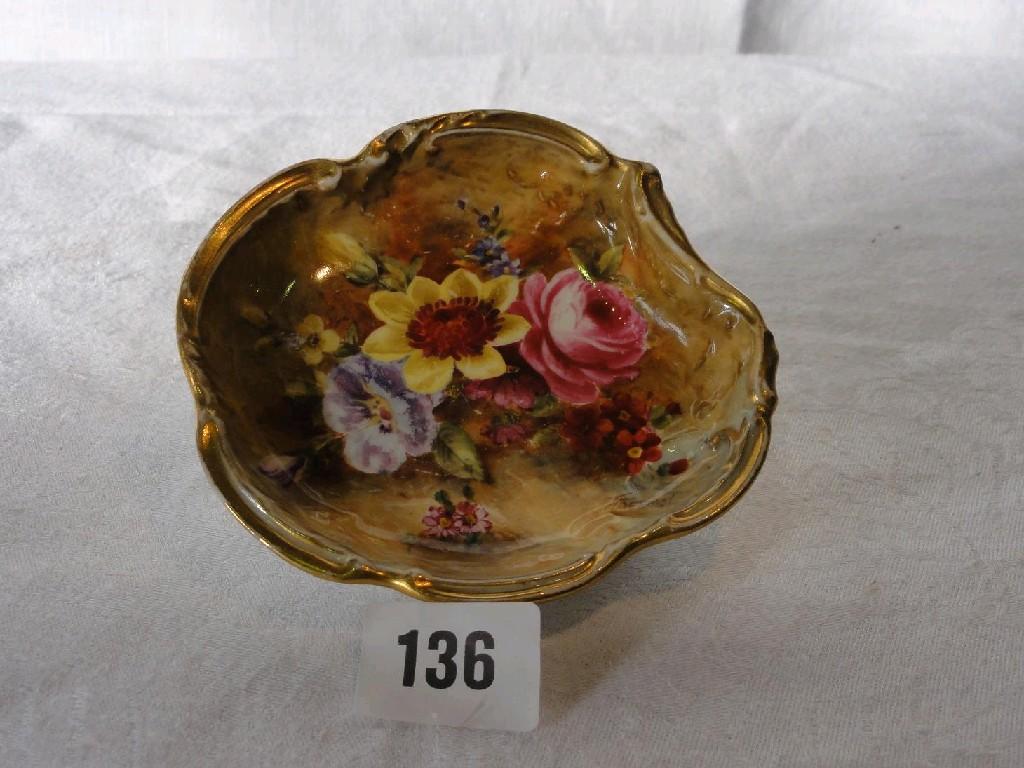 Appraisal: A Royal Worcester dish of shaped outline with painted floral