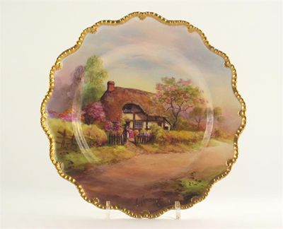 Appraisal: A Royal Worcester plate decorated with a girl standing in