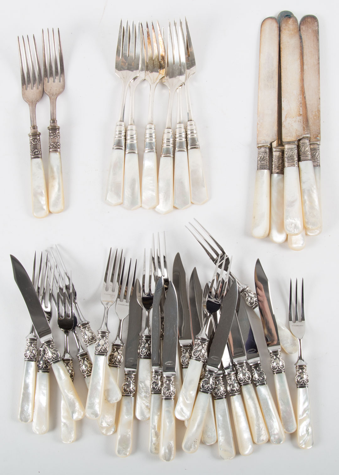 Appraisal: Assortment of mother-of-pearl handled flatware