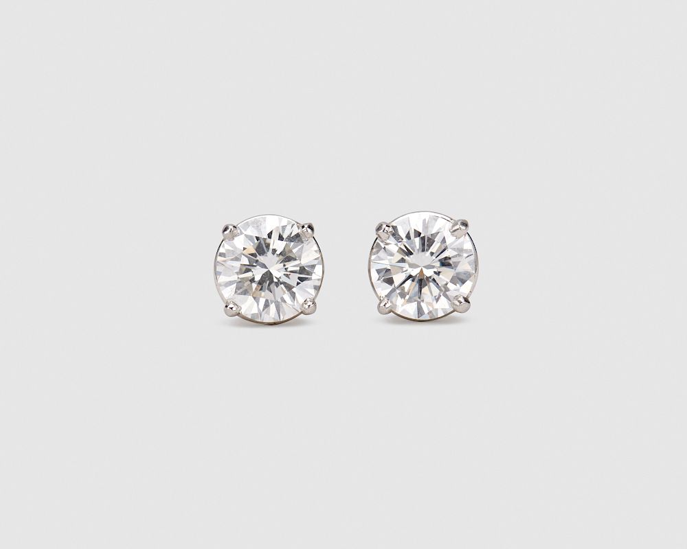 Appraisal: Platinum and Diamond Stud Earrings Platinum and Diamond Stud Earrings