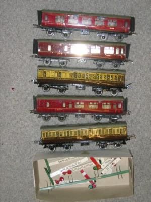 Appraisal: Three Hornby No L M S Coaches some rusting damaged