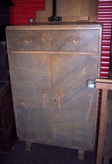 Appraisal: A Heal's millinery cupboard cm wide a matching head board