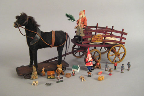 Appraisal: Painted Santa Claus wagon th c together with a horse