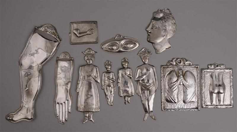 Appraisal: ELEVEN ITALIAN SILVER AND SILVER-PLATED VOTIVE PIECES Four marked variously