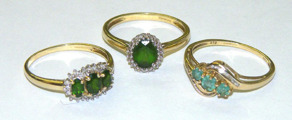 Appraisal: Three ct peridot rings