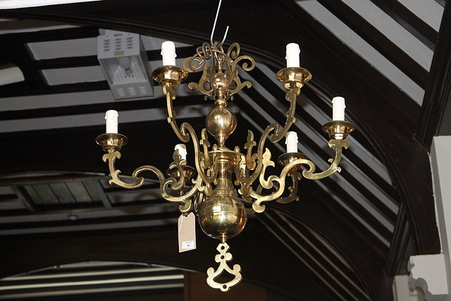 Appraisal: A DUTCH STYLE SIX BRANCH BRASS CHANDELIER with scroll branches