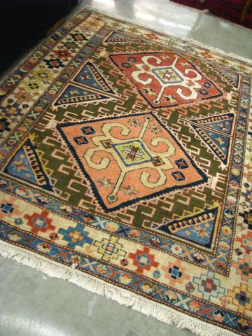 Appraisal: Tribal motif Oriental Rug with geometric figure pattern ' ''