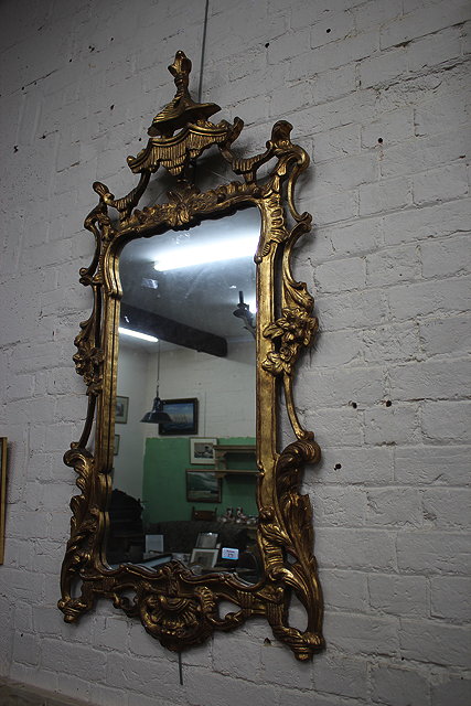 Appraisal: AN EARLY TH CENTURY GILT FRAMED WALL MIRROR in the