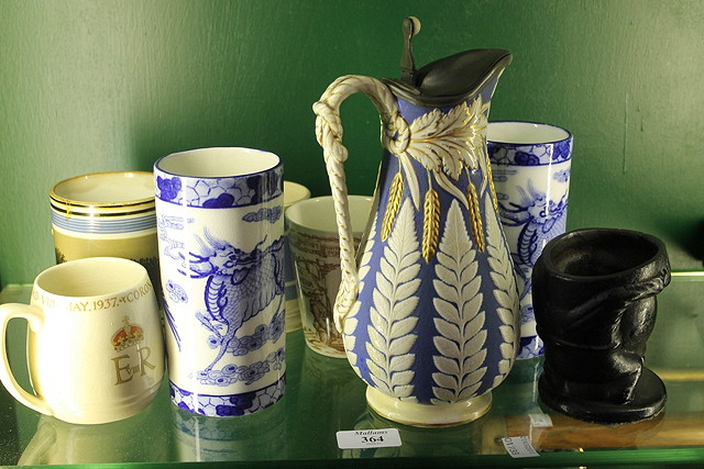 Appraisal: A SMALL COLLECTION OF POTTERY to include two Mocha jugs