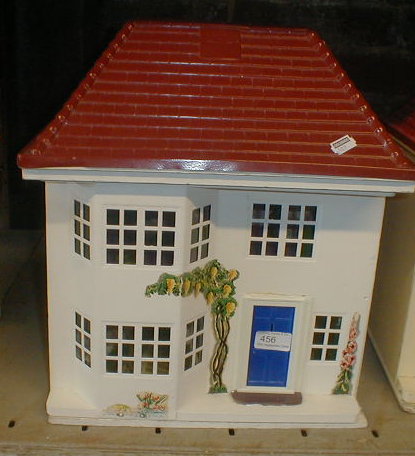 Appraisal: A plastic roofed dolls house and contents