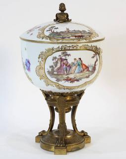 Appraisal: Continental porcelain and gilt bronze covered urn Continental porcelain and