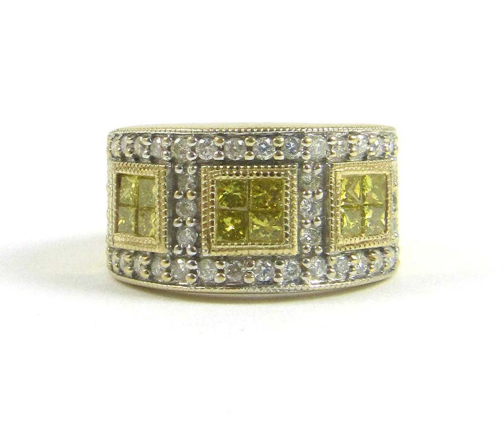 Appraisal: FANCY YELLOW DIAMOND AND FOURTEEN KARAT GOLD RING with round-cut