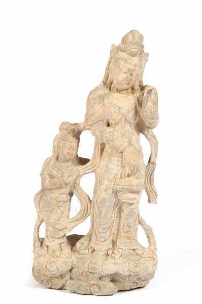 Appraisal: A Chinese Tang-style carved stone figure of Guanyin and an