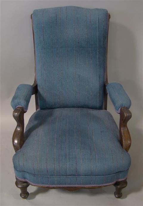 Appraisal: VICTORIAN BLUE UPHOLSTERED ARMCHAIR AND A VICTORIAN ROCKER The arm