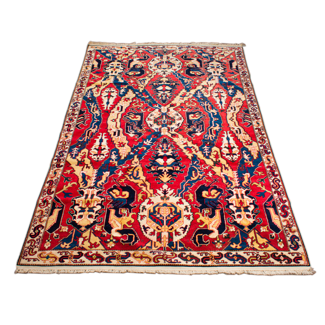 Appraisal: CAUCASIAN CARPET Caucasian carpet a loose interpretation of the Dragon