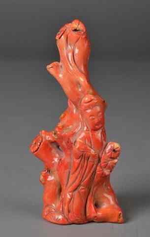 Appraisal: A Fine Chinese Coral CarvingFinely carved to depict Guan-Yin under