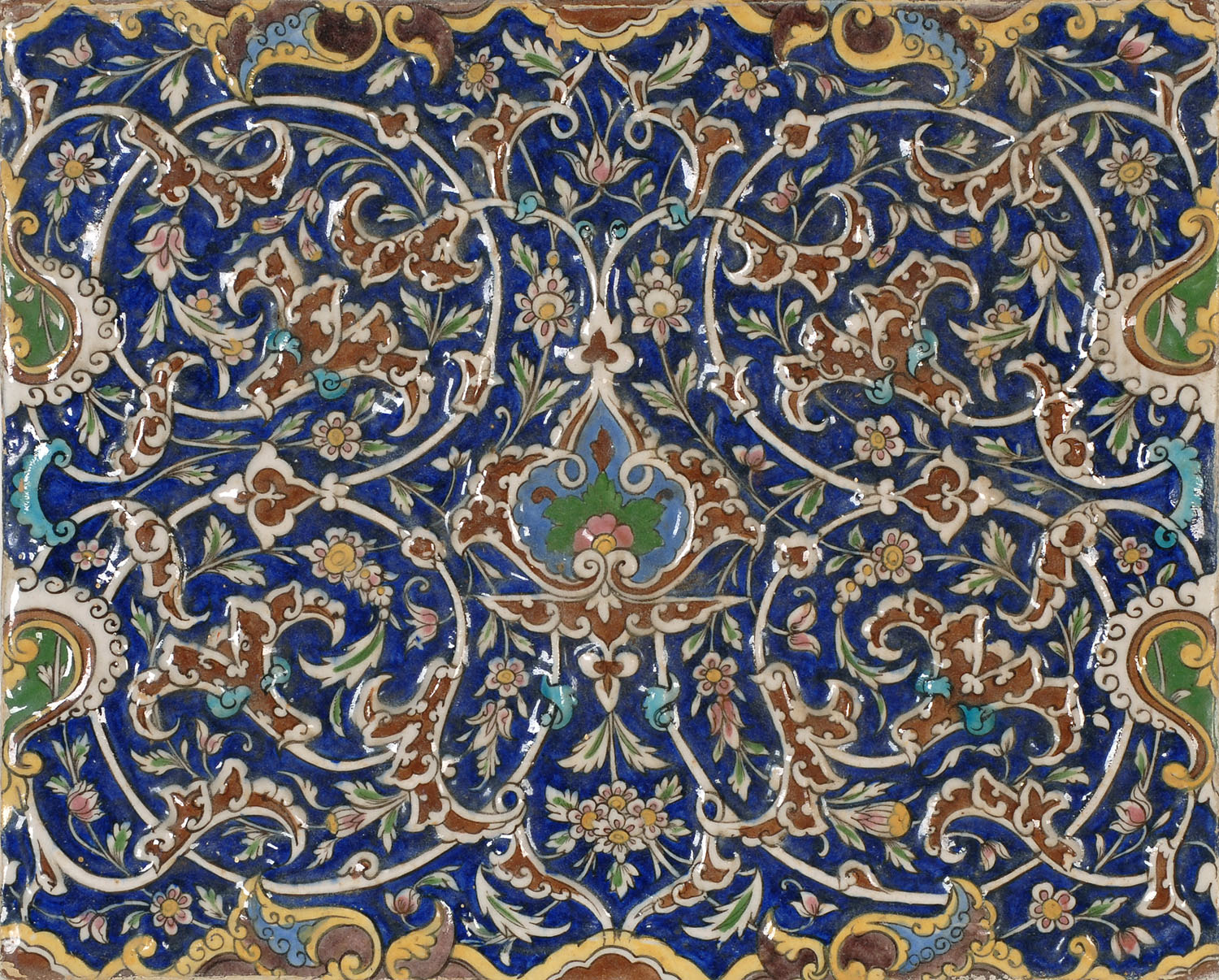 Appraisal: QAJAR TILE th CenturyWith stylized floral and arabesque designs x