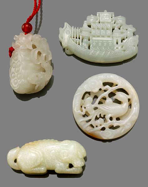 Appraisal: A group of four nephrite pendants The first depicting an