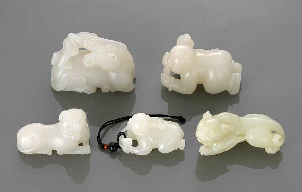 Appraisal: A group of five miniature jade carvings The white jade