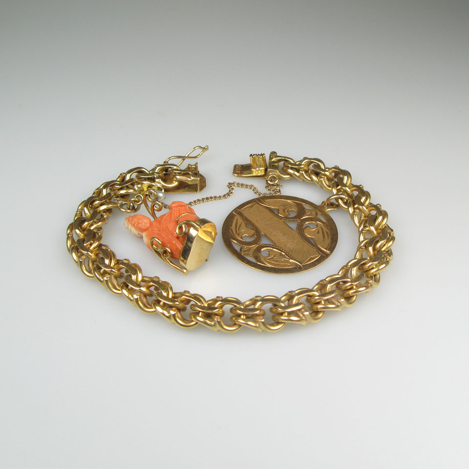 Appraisal: k Yellow Gold Bracelet with a gold and carved coral