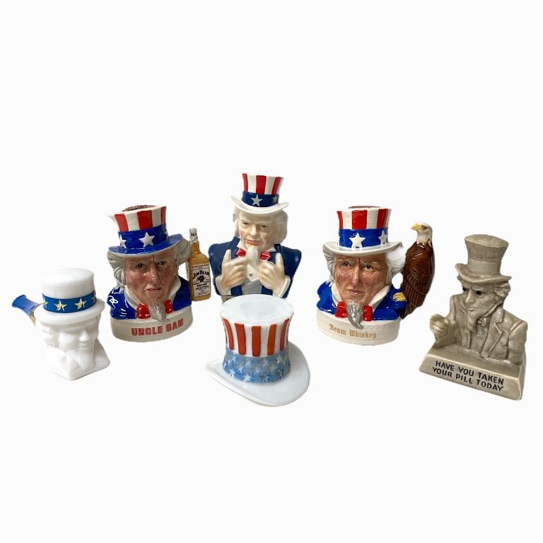 Appraisal: Uncle Sam Misc Jugs And Figurines Uncle Sam Misc Jugs