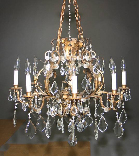 Appraisal: A Rococo style gilt metal and cut glass eight light