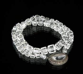 Appraisal: A Strand of Clear Quartz Beads with a Clasp This